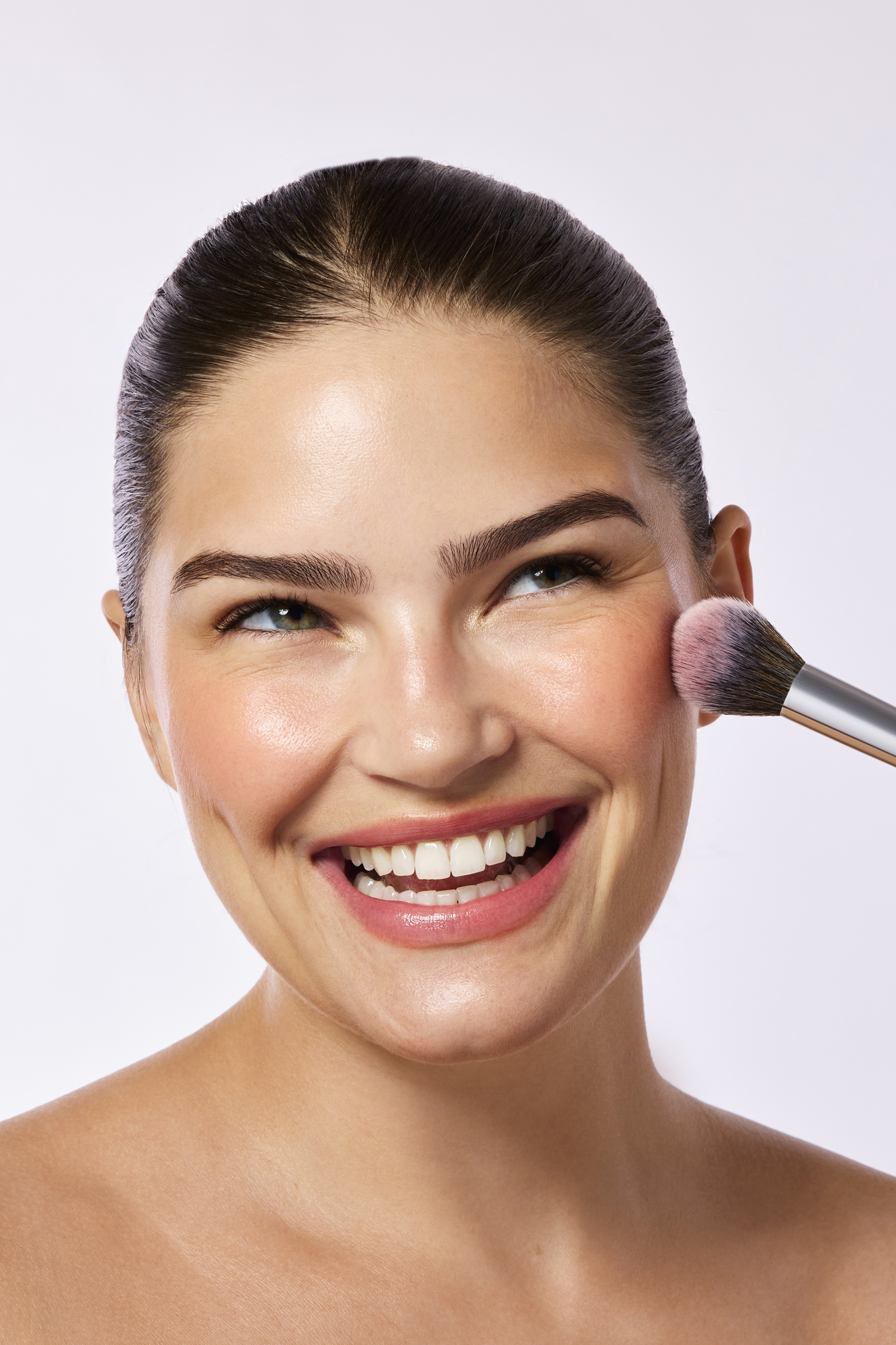 Commercial beauty retouching for cosmetics brands showing natural skin texture preservation