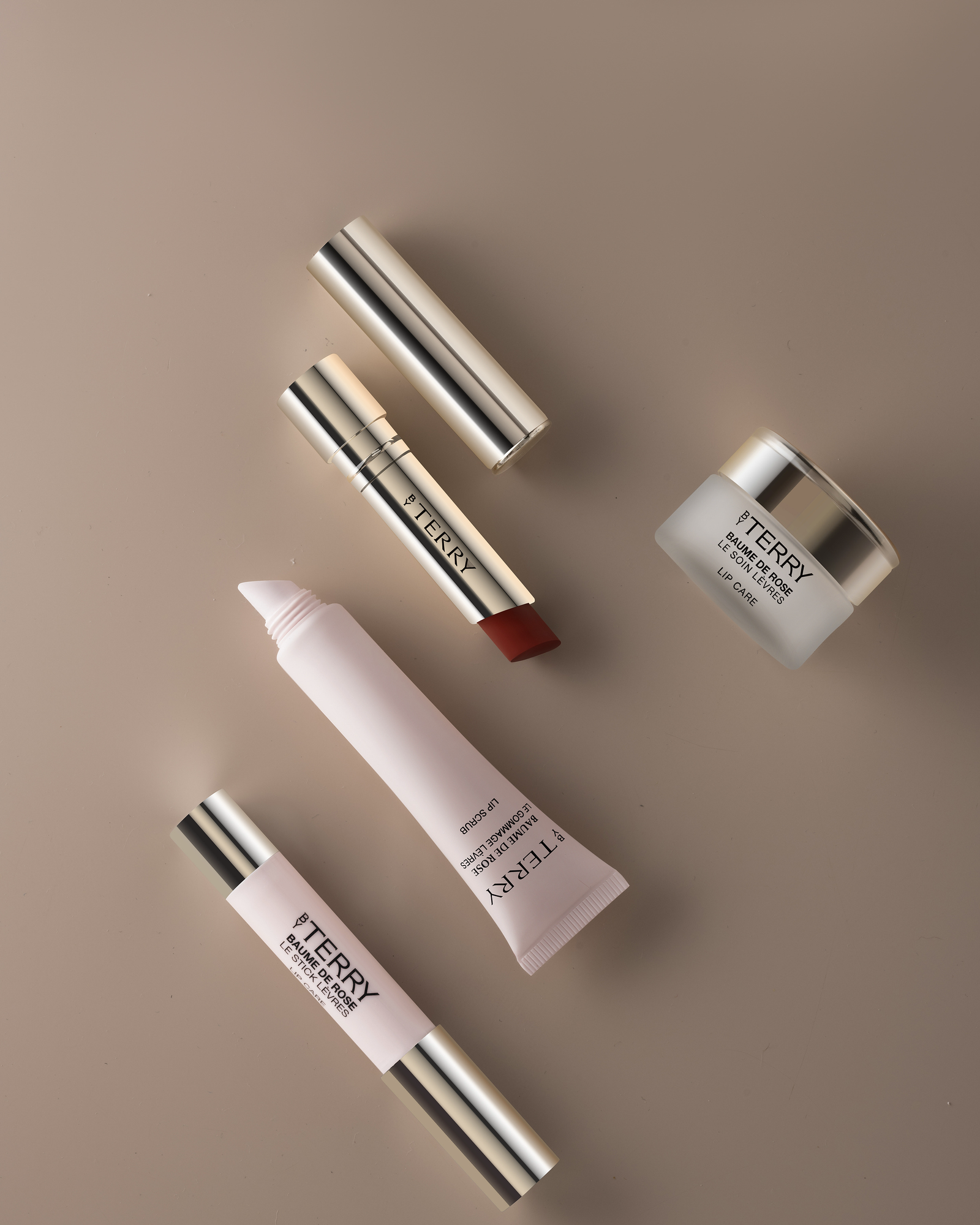 Luxury cosmetics product retouching for makeup brands: By Terry lipsticks and skincare still life, campaign-ready color