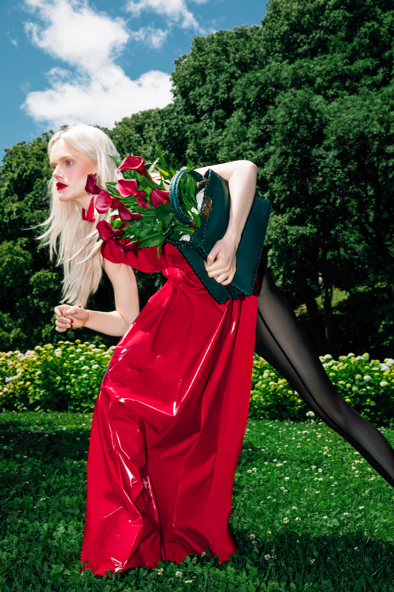 Avant-garde fashion campaign retouching featuring vinyl dress luxury apparel and professional color grading