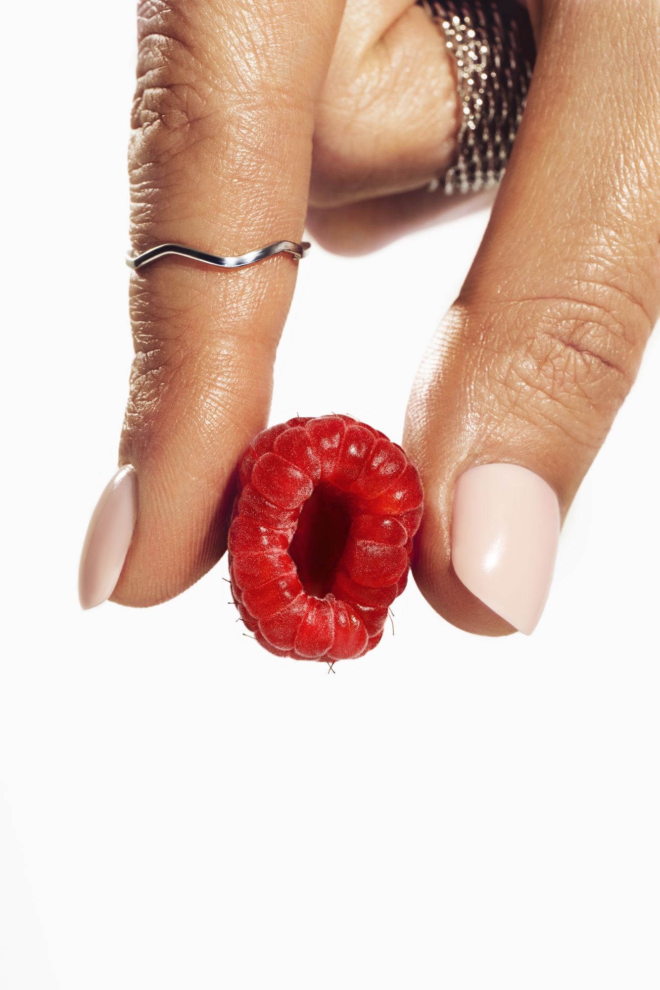 Beauty still life retouching for cosmetic and nail brands — manicure, skin and product texture for photographers