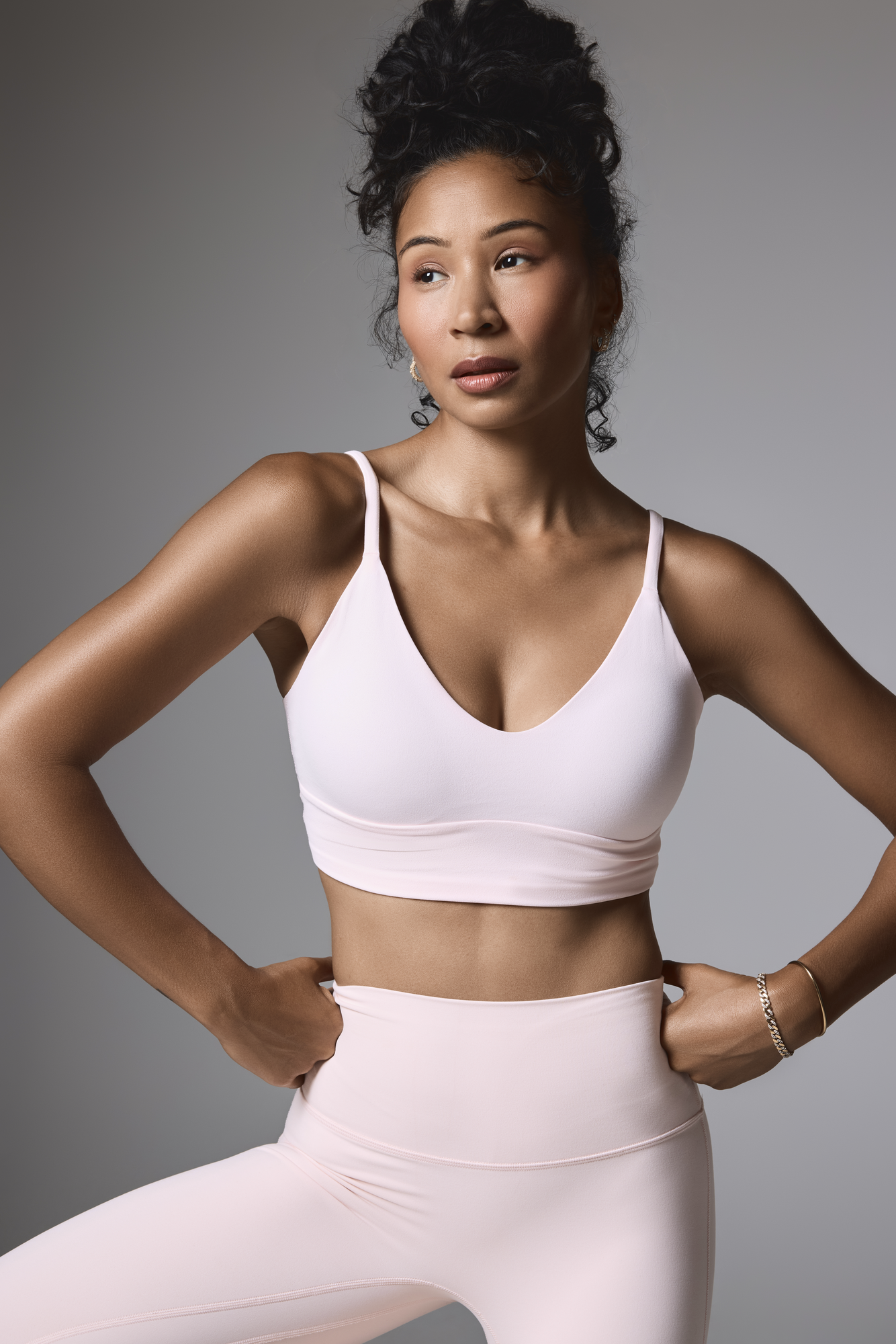 Commercial lookbook retouching for activewear and lingerie brands — natural skin, clean studio, photographer-ready catalog images