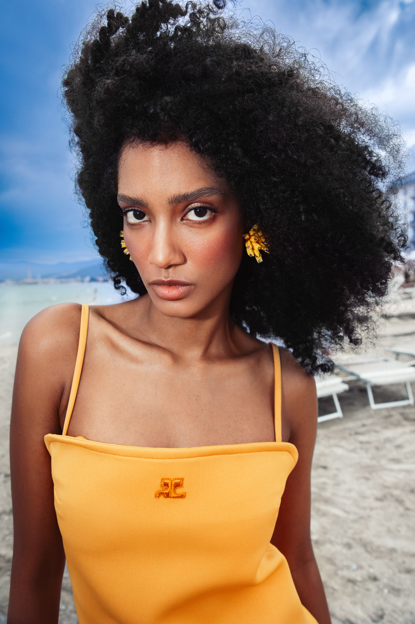 Outdoor fashion campaign retouching for designer clothing brand featuring professional color grading